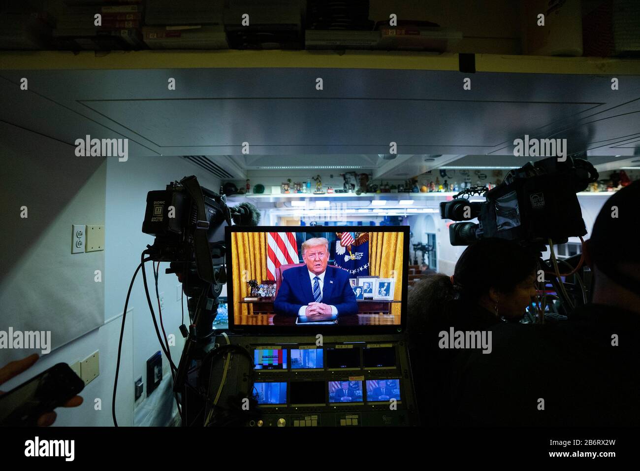 A monitor is seen in the James S. Brady Press Briefing Room of the White House in Washington, DC, U.S., on Wednesday, March 11, 2020 as United States President Donald J. Trump addresses the nation from the Oval Office. Trump announced a month long travel ban to Europe, as well as economic aid to businesses in areas affected by the Coronavirus. Credit: Stefani Reynolds/CNP /MediaPunch Stock Photo