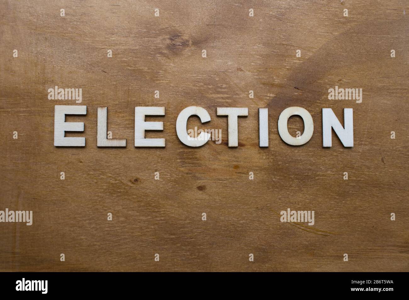 Election concept - letters on wood background. Stock Photo