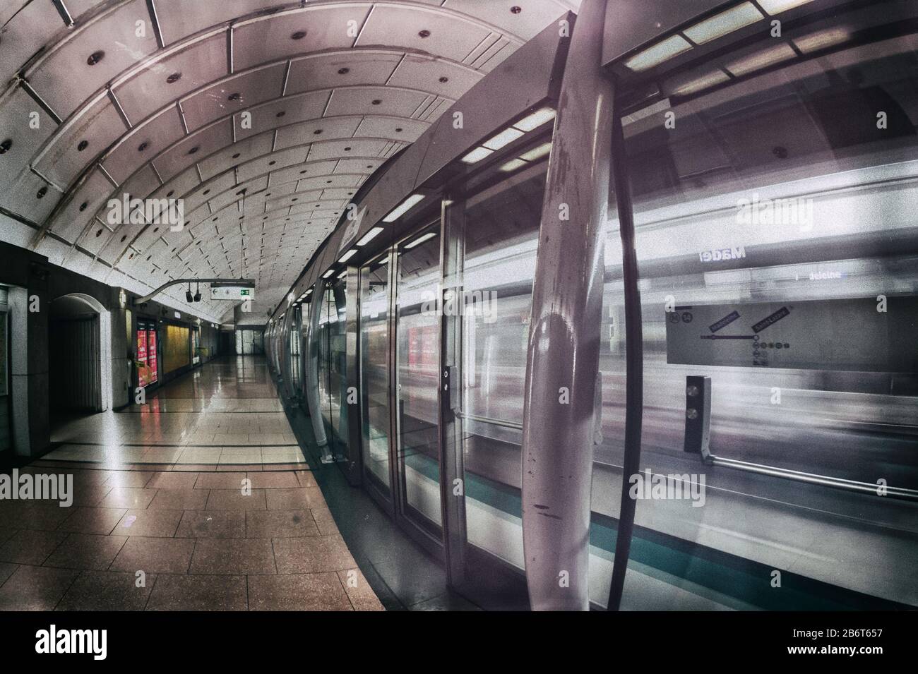 Computer-controlled, automated express train on line 14 leaving Madeleine Metro station, Right Bank, Paris, France, Europe Stock Photo