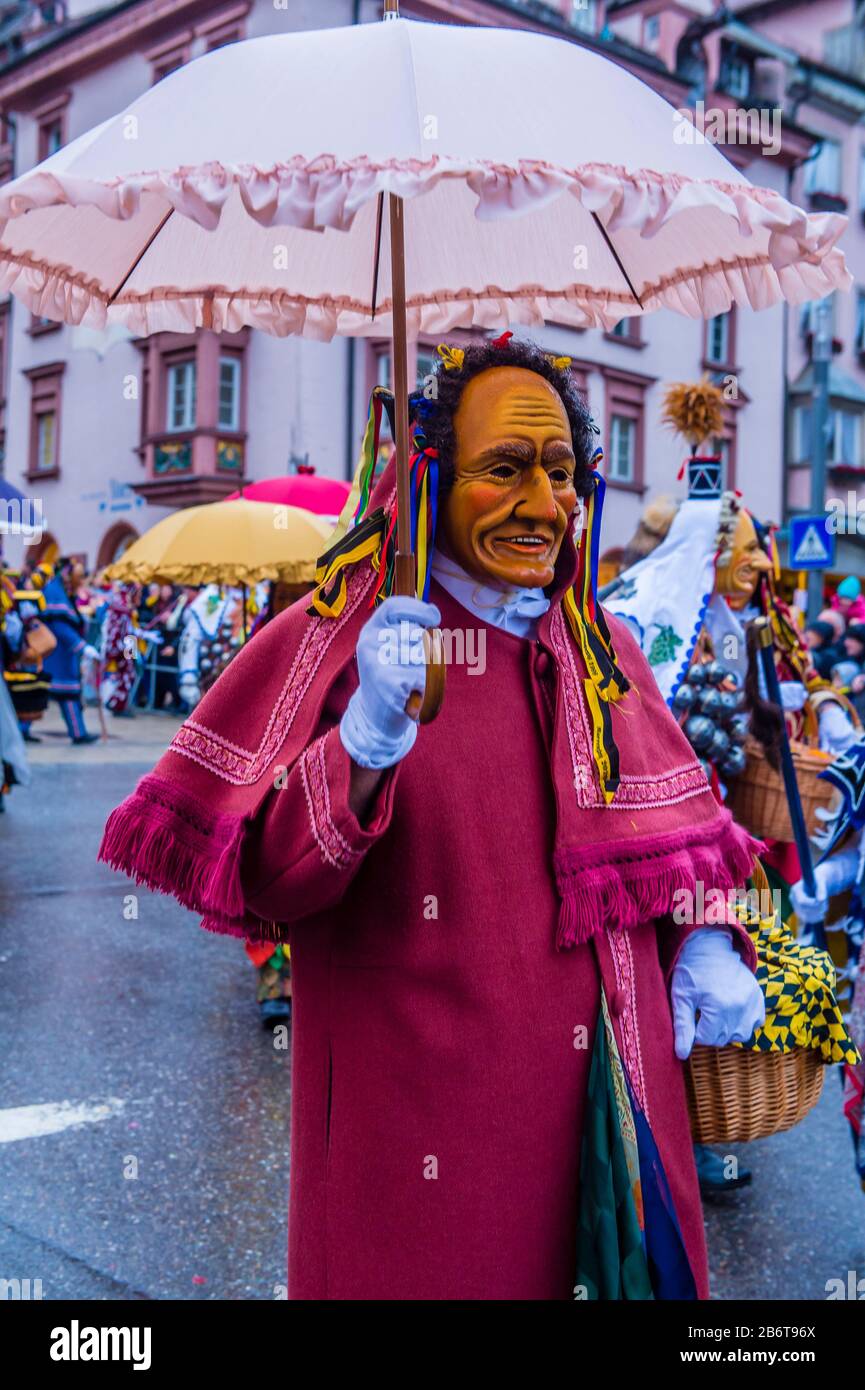 ROTTWEIL , GERMANY - FEB 24 : Participants in the Rottweil Carnival in Rottweil , Germany on February 24 2020.  The carnival known as Fasnacht is a cu Stock Photo