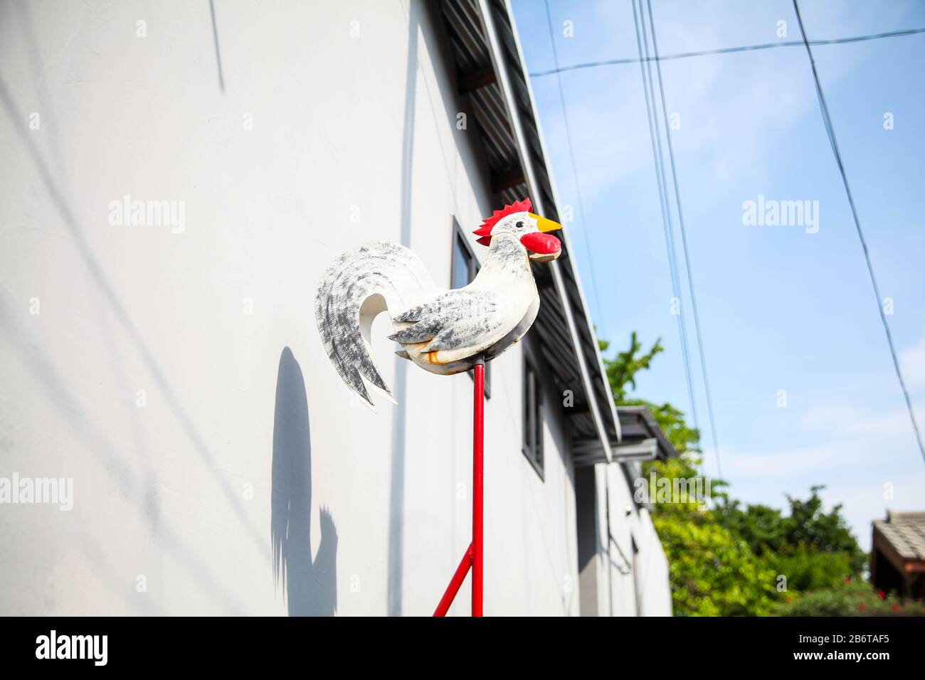 Realistic white chicken rooster wind vane on a red stick Stock Photo ...