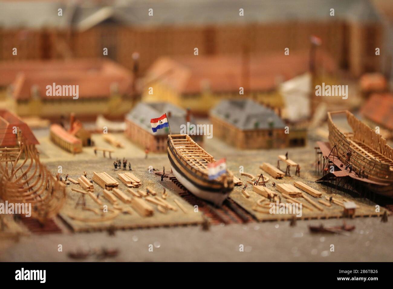 Bonn, Germany. 11th Mar, 2020. A wooden model of a shipyard of the Dutch East India Company is placed in a showcase. The exhibition 'Wir Kapitalisten - Von Anfang bis Turbo' can be seen from 13 March to 12 July 2020 in the Bundeskunsthalle. Credit: Oliver Berg/dpa - ATTENTION: For editorial use only in connection with reporting on the exhibition/dpa/Alamy Live News Stock Photo