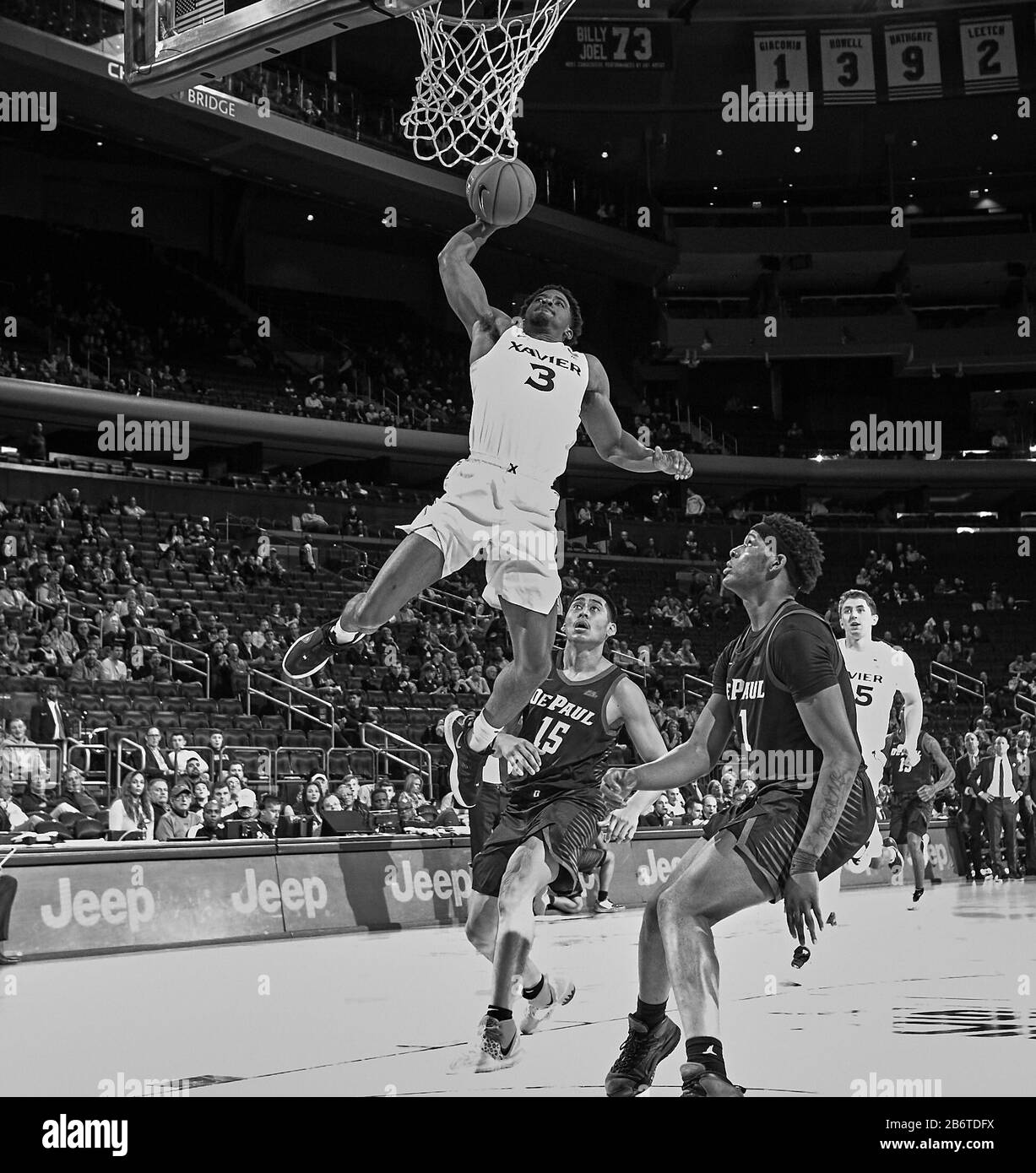 New York, New York, USA. 11th Mar, 2020. Xavier Musketeers guard Quentin Goodin (3) gets up for a dunk attempt in the first half during first round Big East Tournament play at Madison Square Garden in New York City. Duncan Williams/CSM/Alamy Live News Stock Photo