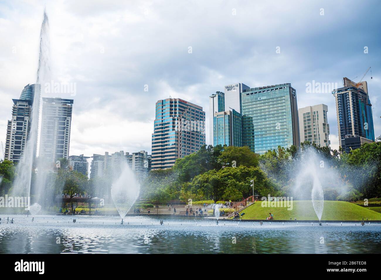 Cityscape of Kuala Lumpur. Beautiful green central park with fountains ...