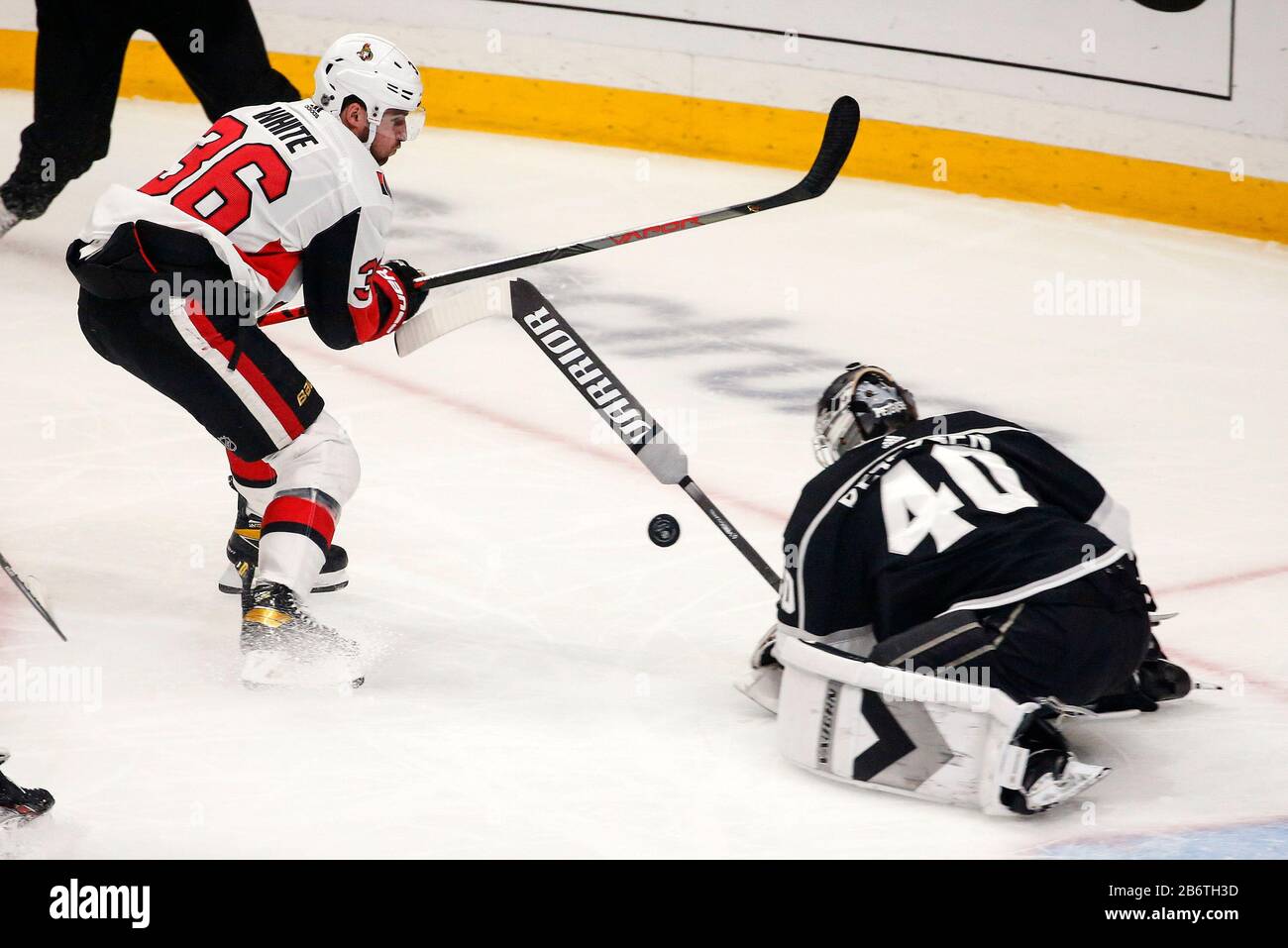 Los Angeles, California, USA. 11th Mar, 2020. Los Angeles Kings goalie Calvin Petersen (40) makes a save shot by Ottawa Senators' forward Colin White (36) during a 2019-2020 NHL hockey game between Los Angeles Kings and Ottawa Senators in Los Angeles, on March 11, 2010. Credit: Ringo Chiu/ZUMA Wire/Alamy Live News Stock Photo