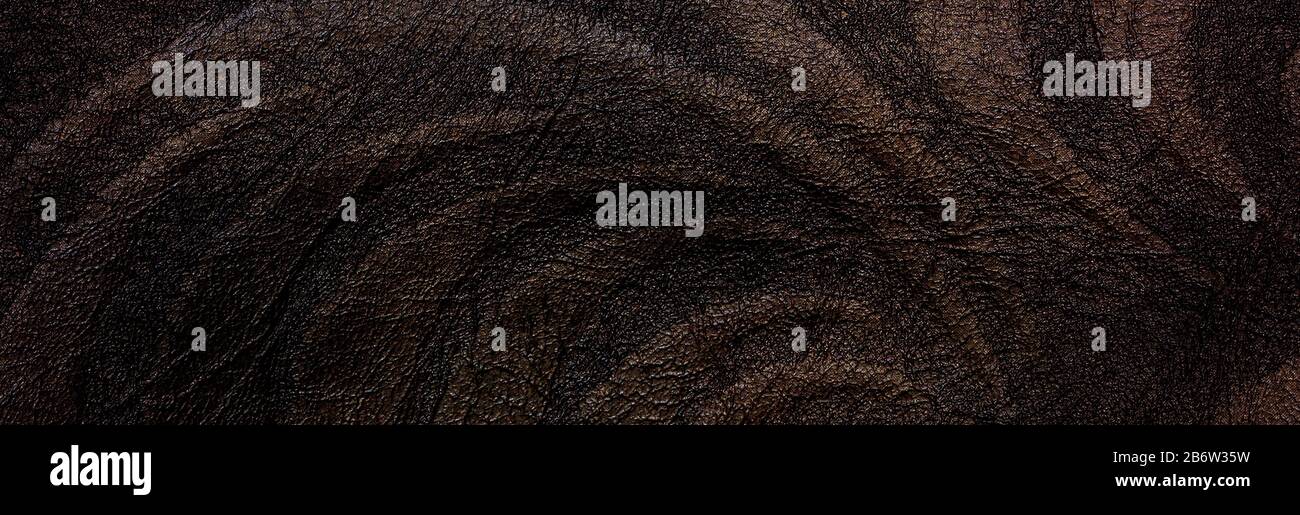 A banner of brown leather texture with a pattern. Background Stock Photo