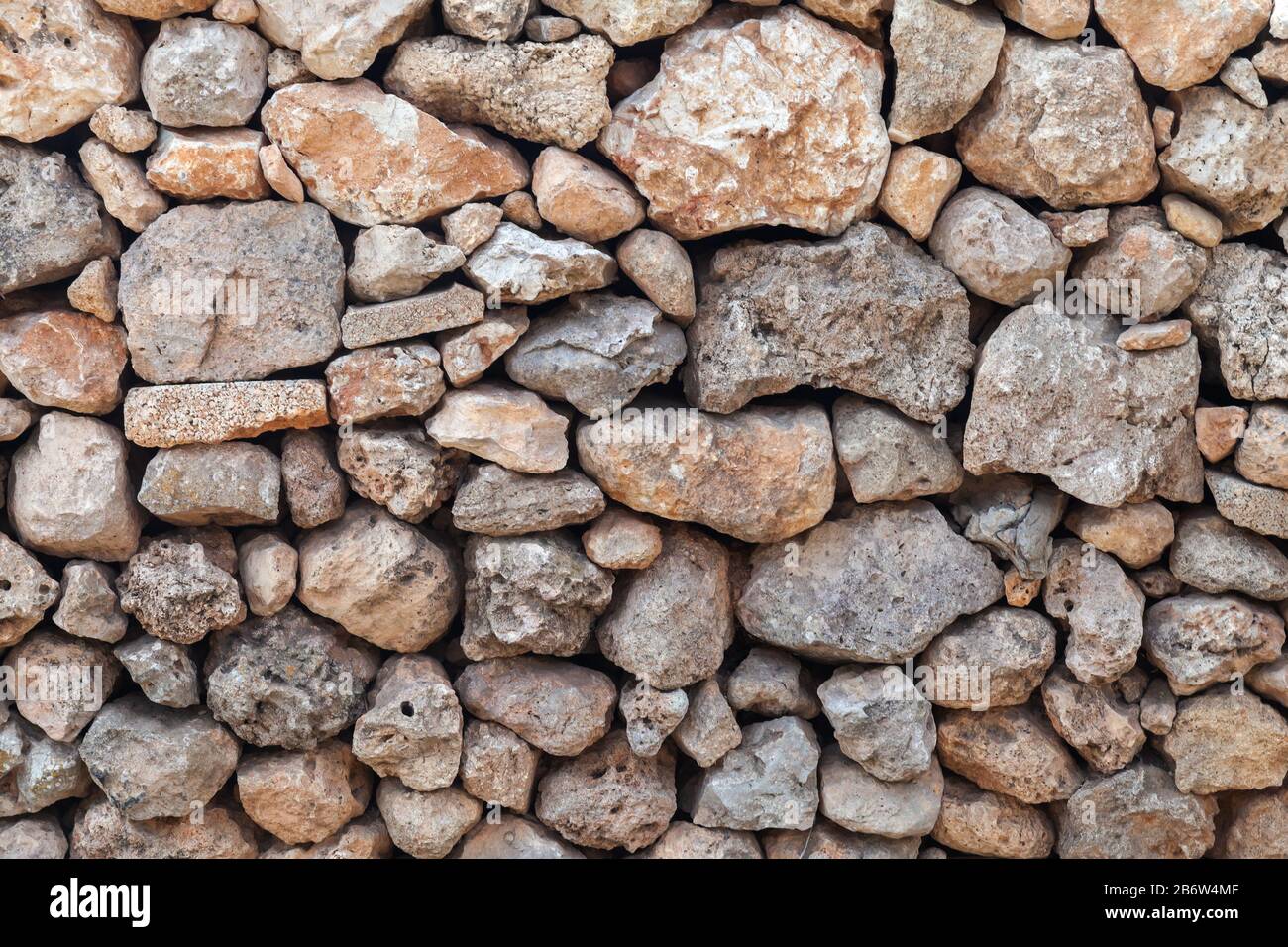 Old wall rough stones hi-res stock photography and images - Alamy