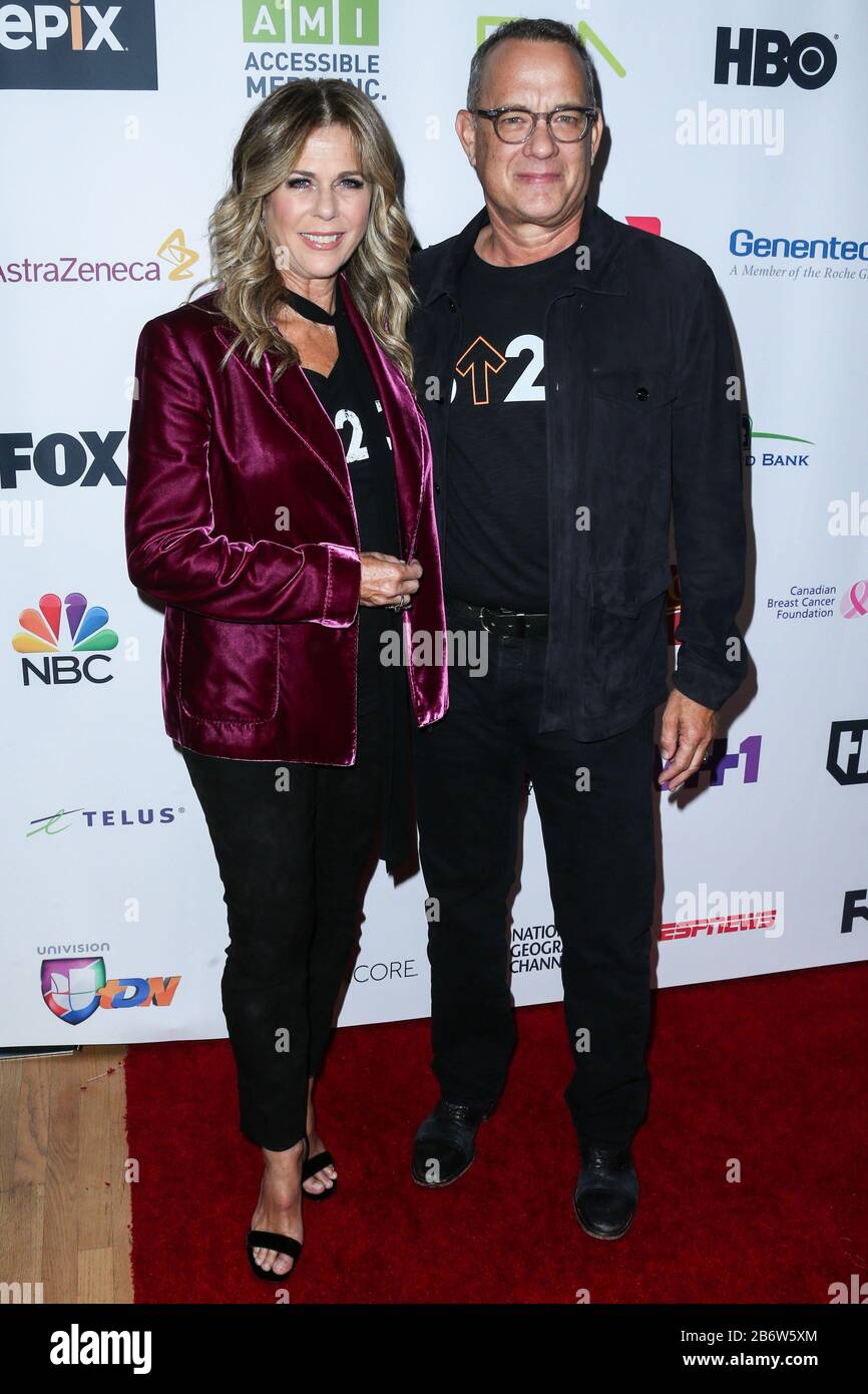 (FILE) Tom Hanks and Rita Wilson Test Positive for Coronavirus COVID-19. Tom Hanks and Rita Wilson have announced on Wednesday, March 11, 2020 that they have tested positive for COVID-19 (Coronavirus), the first celebrities to go public with a diagnosis. LOS ANGELES, CALIFORNIA, USA - SEPTEMBER 09: Actress Rita Wilson and husband/actor Tom Hanks arrive at the Stand Up To Cancer 2016 held at the Walt Disney Concert Hall on September 9, 2016 in Los Angeles, California, United States. (Photo by Xavier Collin/Image Press Agency) Stock Photo