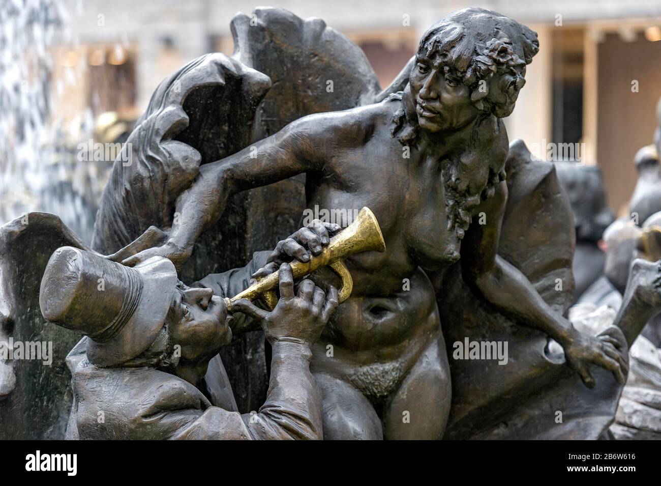 Husband as trumpeter with woman as Aphrodite in the Venus Shell, Hans-Sachs-Fountain, also Marriage Carousel or Marriage Fountain by Juergen Weber Stock Photo