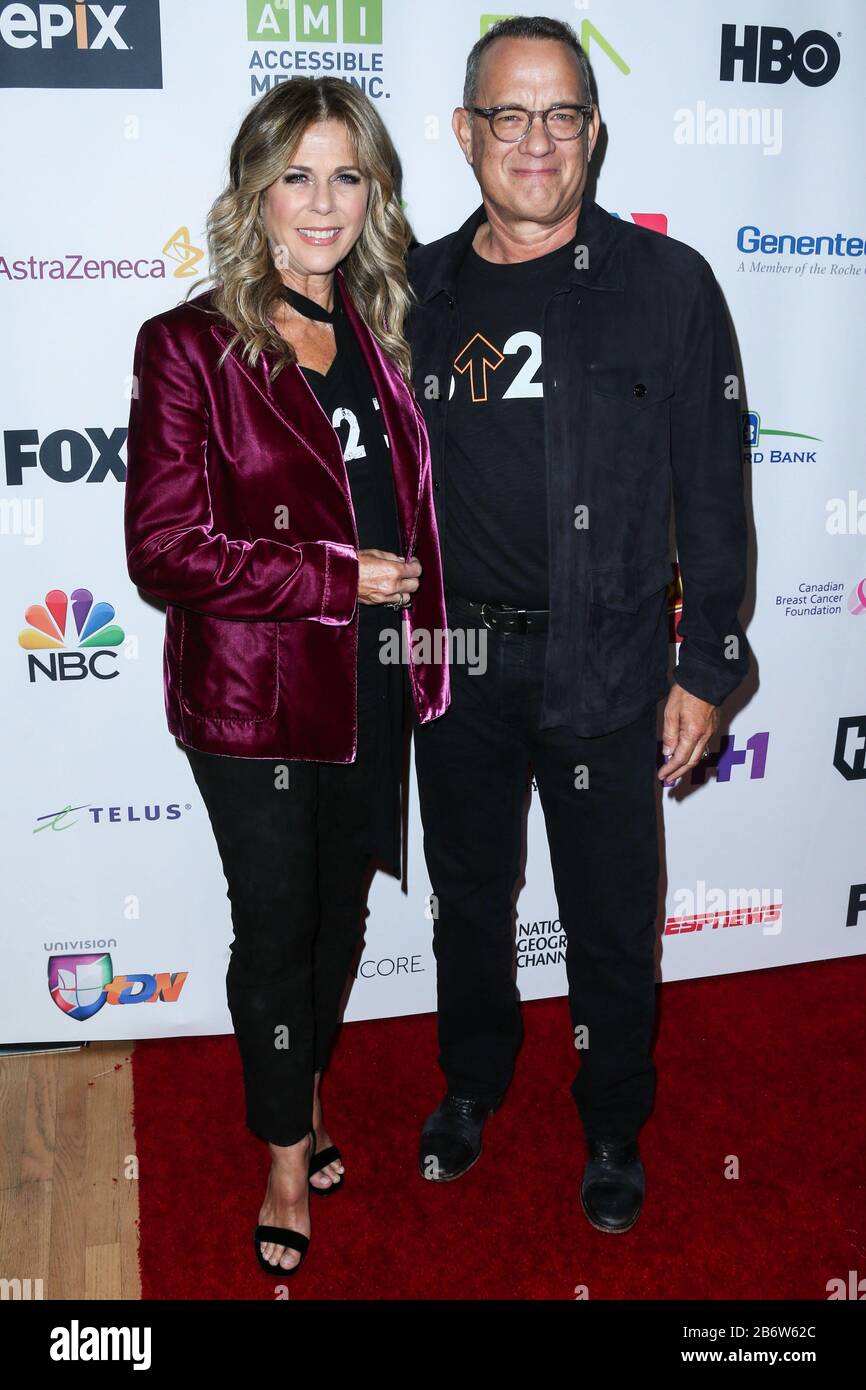 (FILE) Tom Hanks and Rita Wilson Test Positive for Coronavirus COVID-19. Tom Hanks and Rita Wilson have announced on Wednesday, March 11, 2020 that they have tested positive for COVID-19 (Coronavirus), the first celebrities to go public with a diagnosis. LOS ANGELES, CALIFORNIA, USA - SEPTEMBER 09: Actress Rita Wilson and husband/actor Tom Hanks arrive at the Stand Up To Cancer 2016 held at the Walt Disney Concert Hall on September 9, 2016 in Los Angeles, California, United States. (Photo by Xavier Collin/Image Press Agency) Stock Photo