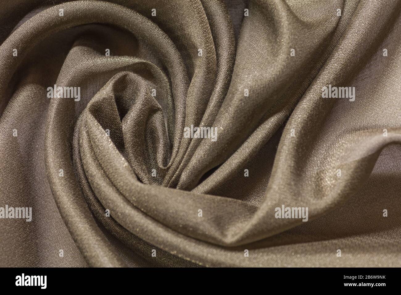 Shiny cloth background with beige vial textile Stock Photo