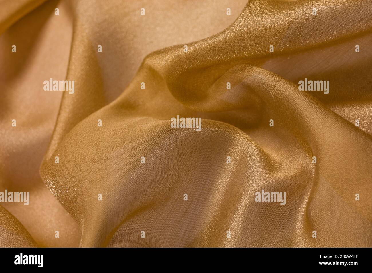 Shiny cloth background with beige vial textile Stock Photo