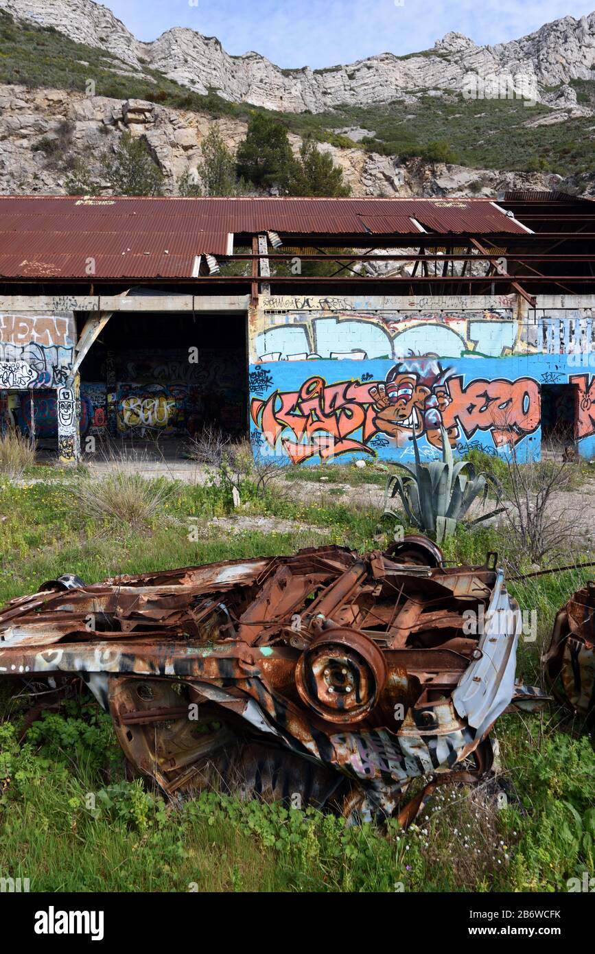 Abandoned Factory, Ruined Industrial Building & Rusty Wrecked Cars, an Urbex Site, in Marseille Provence France Stock Photo