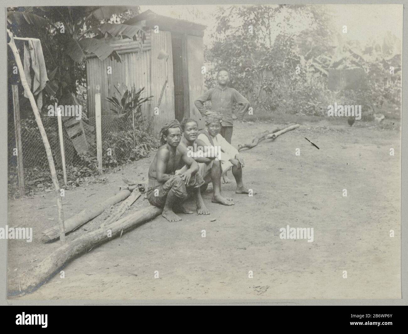 Javanen (titel op object) Four Javanese contract workers. Part of the album Souvenir de Voyage (Part 5), about the life of the Doijer family in and around the plantation Ma Retraite in Suriname during the years 1906-1913. Manufacturer : Photographer: Hendrik Doijer (attributed to) Place manufacture: Suriname Date: 1906 - 1913 Physical features: gelatin silver print material: paper Technique: gelatin silver print dimensions: photo: h 83 mm × W 111 mm Date: 1906 - 1913 Stock Photo