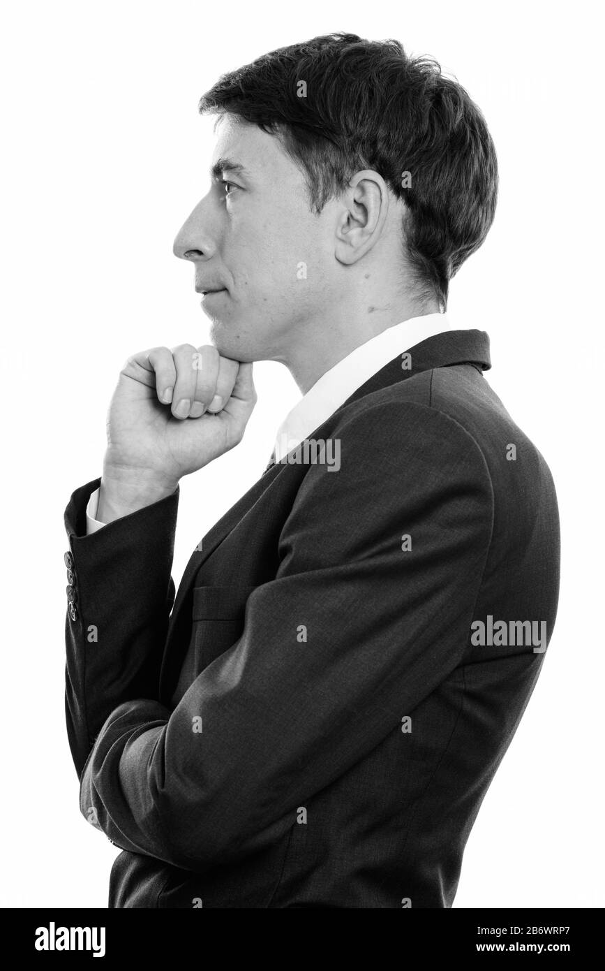 Pensive business guy thinking Black and White Stock Photos & Images - Alamy