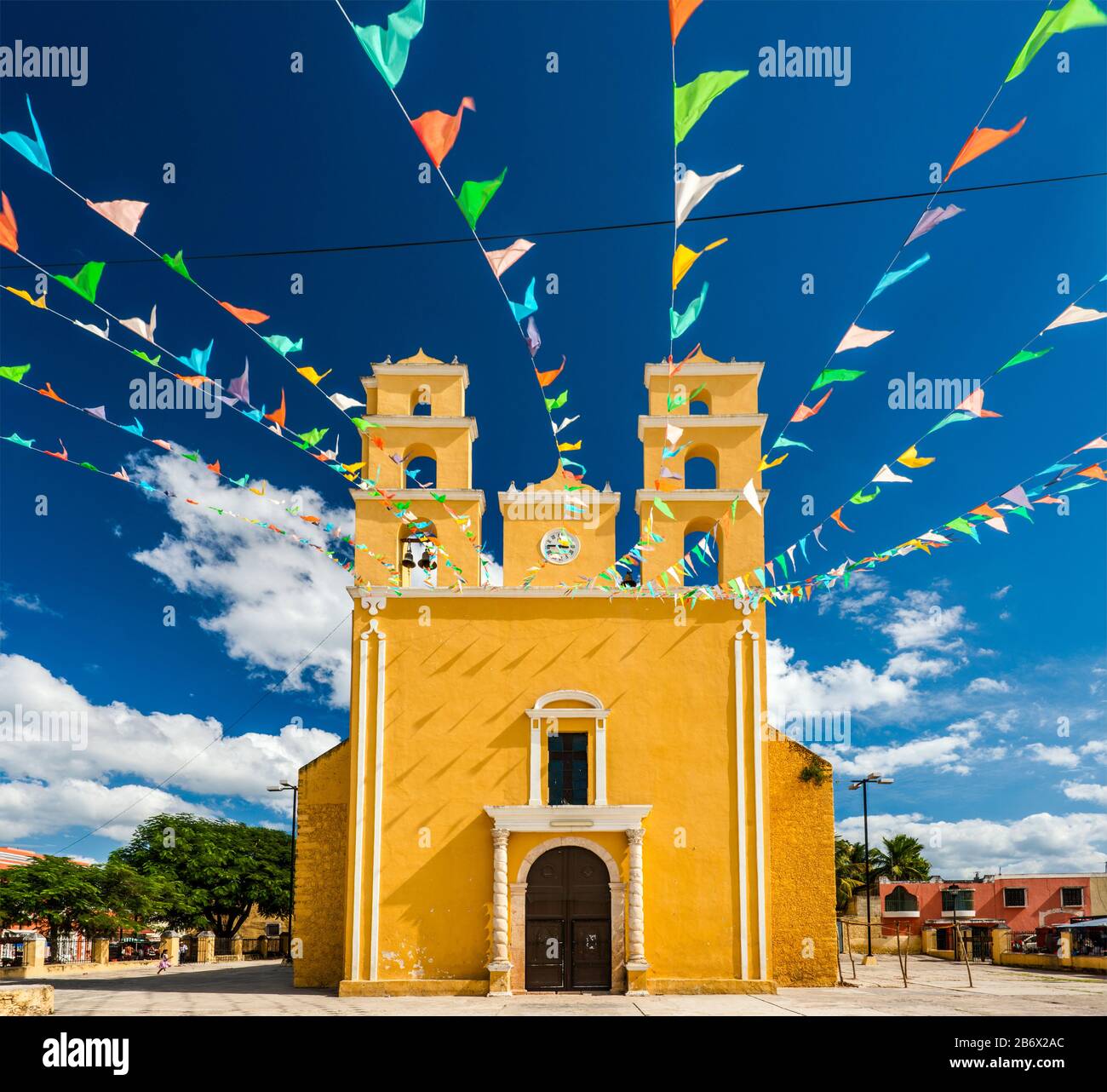 Iglesia de Nuestra Senora de la Natividad, decorated with pennants, in Acanceh, Yucatan state, Mexico Stock Photo