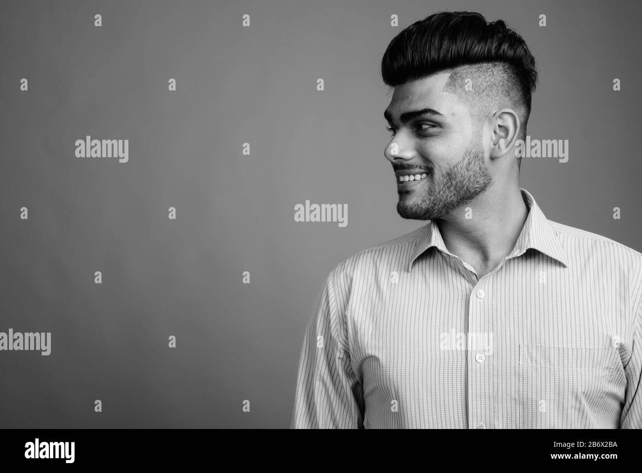 Indian young happy men side view Black and White Stock Photos & Images ...