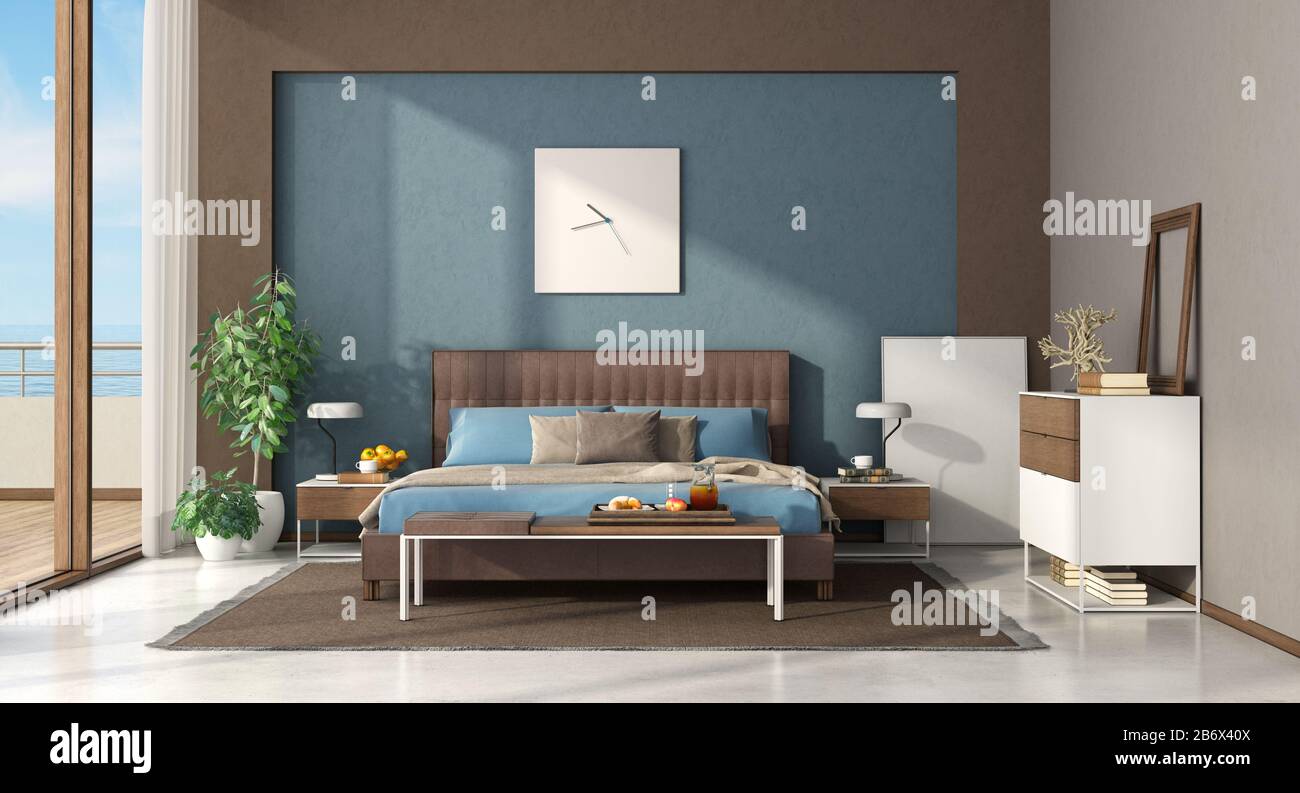 Blue and brown bedroom with leather double bed ,bench and chest of drawers - 3d rendering Stock Photo