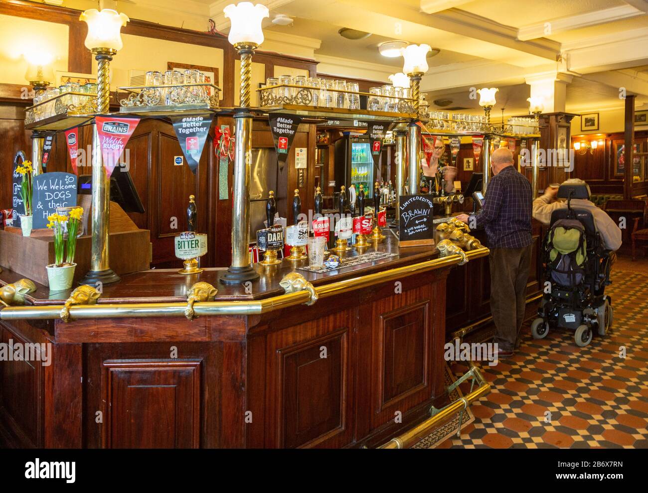 Interior of historic Goat Major pub in city centre of Cardiff, South Wales, UK - bar with Brains beers on sale Stock Photo