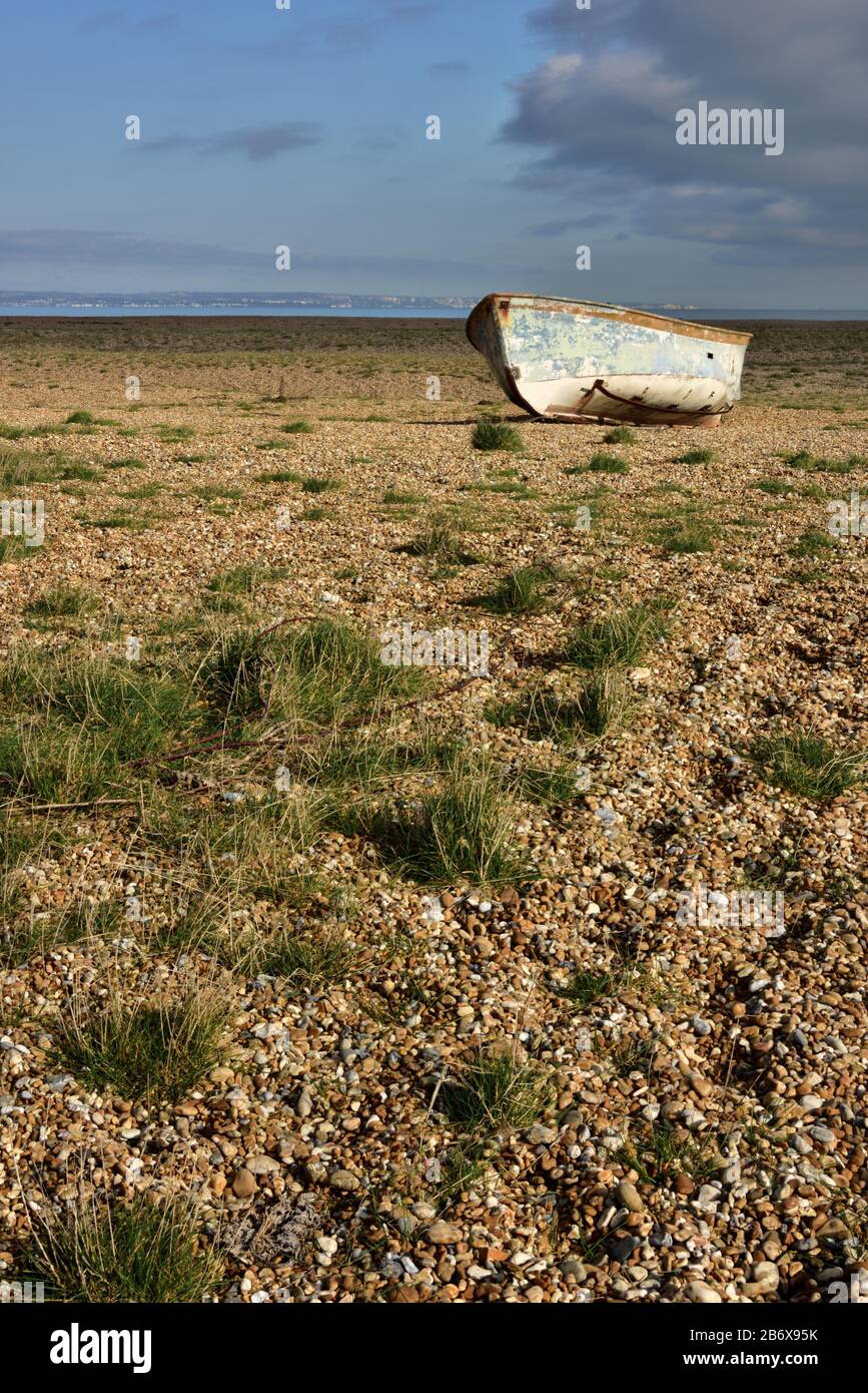 another abandoned rotting wooden boat on the shingle at Dungeness Stock ...