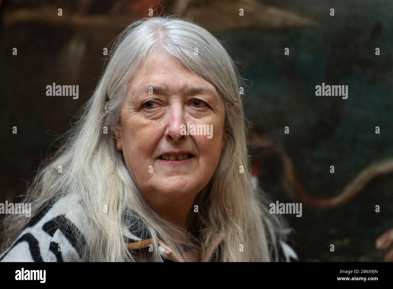 Historian Mary Beard at a press view of Titian's Poesie series of large scale Greek mythological paintings, part of the 'Titian: Love, Desire, Death' exhibition, at the National Gallery, London. The exhibition brings the series of six paintings together in their entirety for the first time since the late 16th century. Stock Photo
