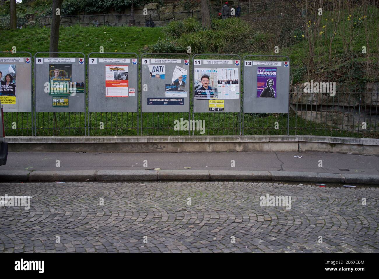 Display panels showing electoral candidates running in French municipal elections, rue Ronsard, Montmartre, 75018 Paris, France, March 2020 Stock Photo