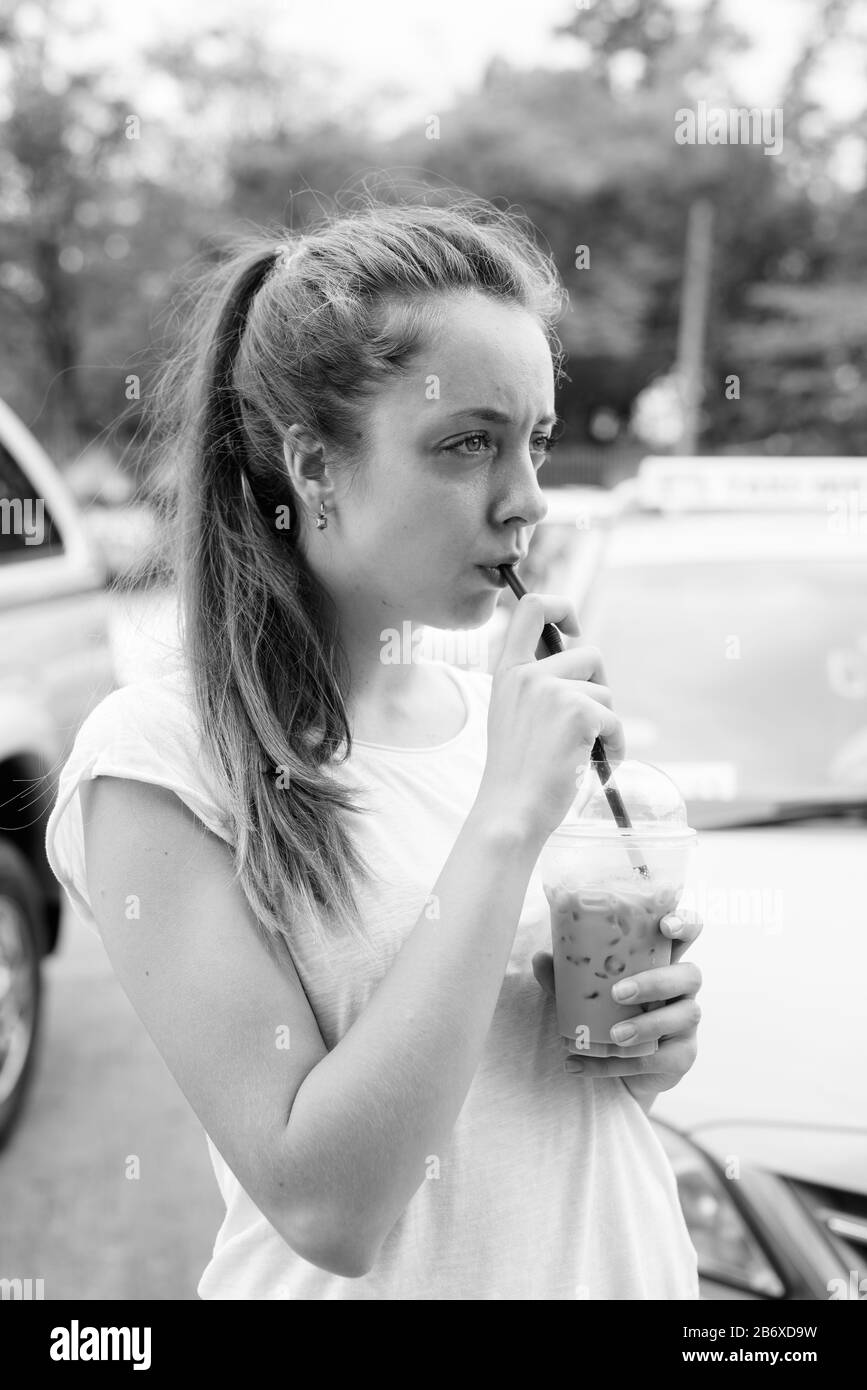 Portrait of young beautiful tourist woman having vacation Stock Photo