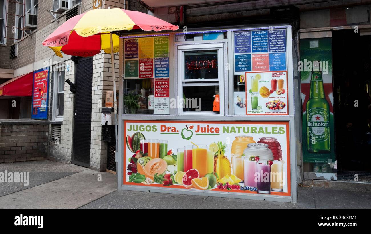 The JUGOS NATURALES juice and smoothie stand on 82nd Street in Jackson Heights, Queens, New York City. Stock Photo