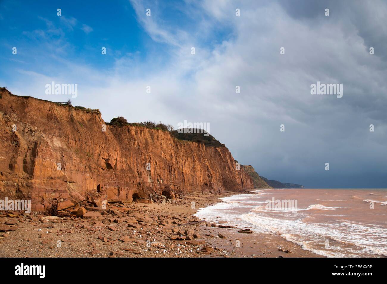 Sidmouth, Devon, UK. 12th March 2020. UK Weather. View of the eroding cliffs East of Sidmouth in Devon on a day of warm spring sunshine and occasional showers where regular landslips are occurring due to the recent stormy weather. Picture Credit: Graham Hunt/Alamy Live News Stock Photo