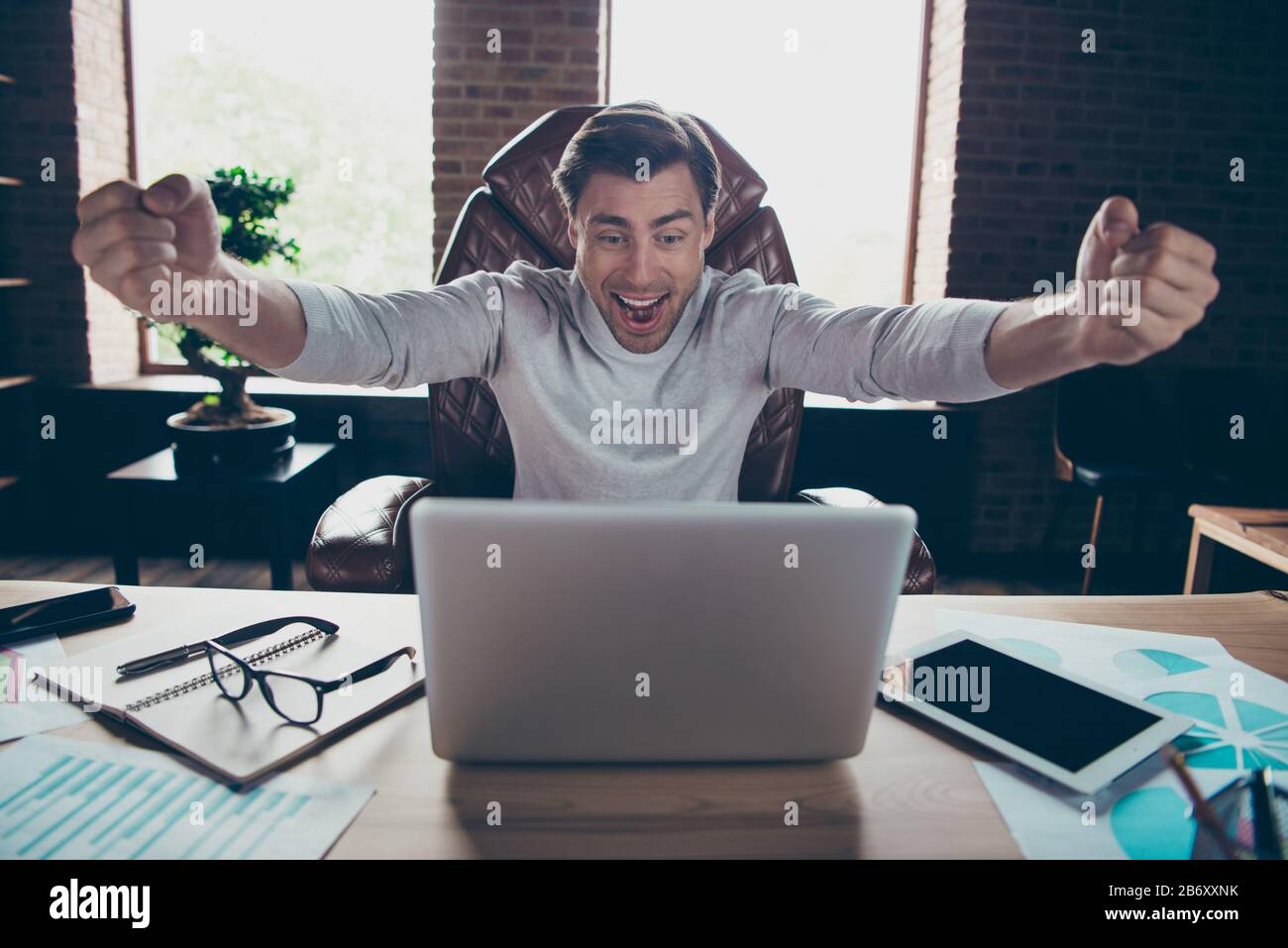 Portrait of his he nice attractive cheerful cheery excited executive