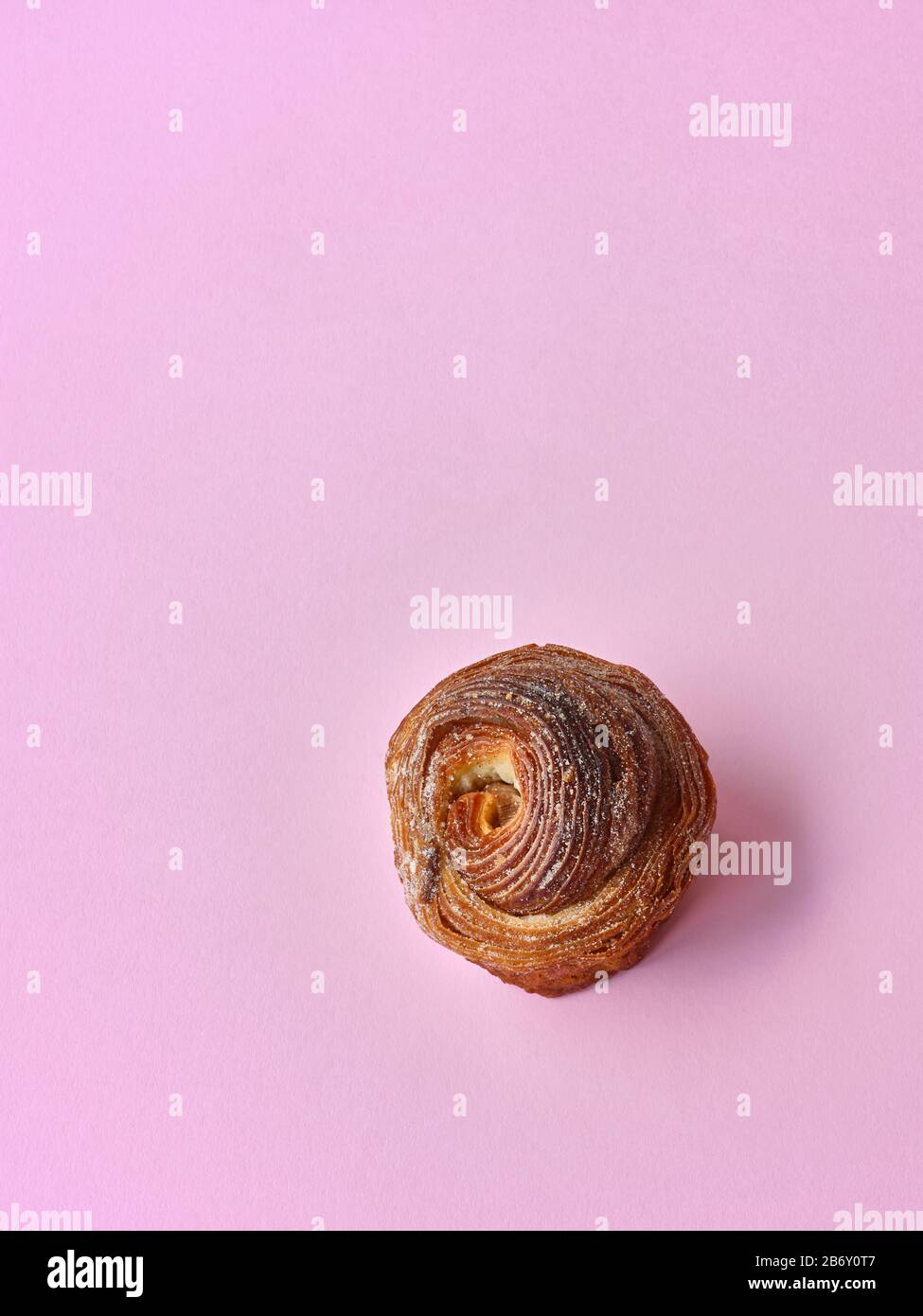 Da Bara Bakery cinnamon buns against a pink background Stock Photo