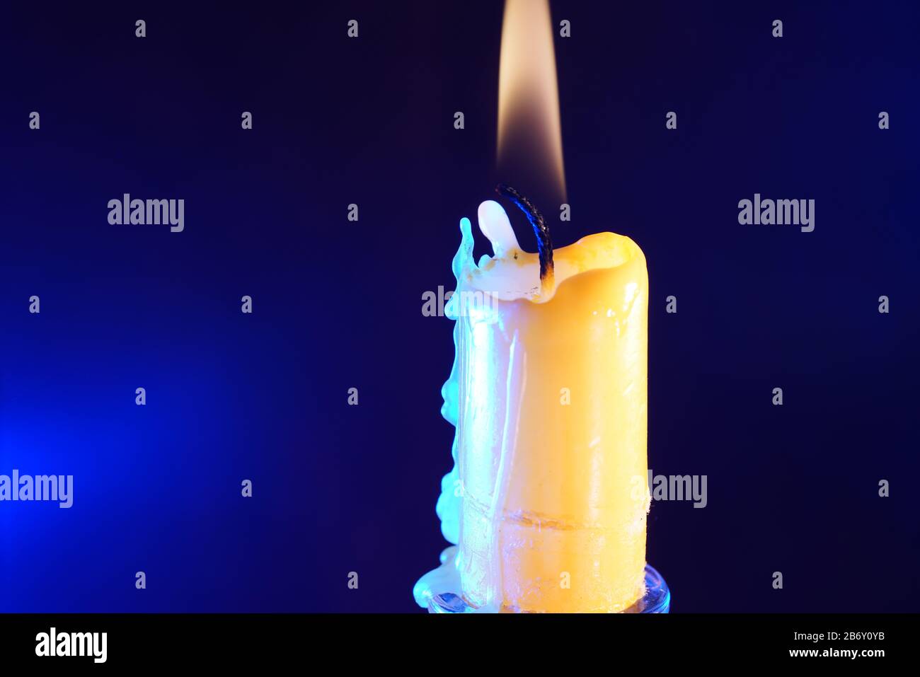 Candles with wax dripping photographed in the studio Stock Photo Alamy