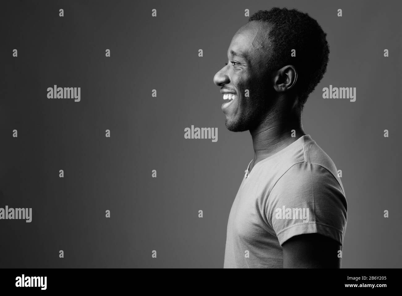 African man smiling side profile Black and White Stock Photos & Images ...