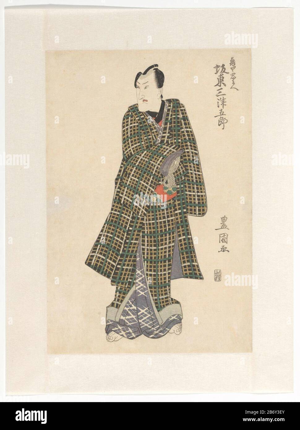 Kamiya Ch^bei in geblokte kimono Kabuki actor Bando Mitsugoro III DEROL Kamiya Chubei in checkered kimono manufacture manufacturer: printmaker: Toyokuni (I), Utagawa ( listed on object) publisher: Iwatoya Kisaburo (listed property) Place manufacture: Japan Date: approx Jan 1813 Physical features: line block in black with color blocks material: paper Technique: color woodblock dimensions: h 373 mm × W 250 mmToelichtingDit the right leaf of a diptych . Left and right blade ontbreekt. Stock Photo