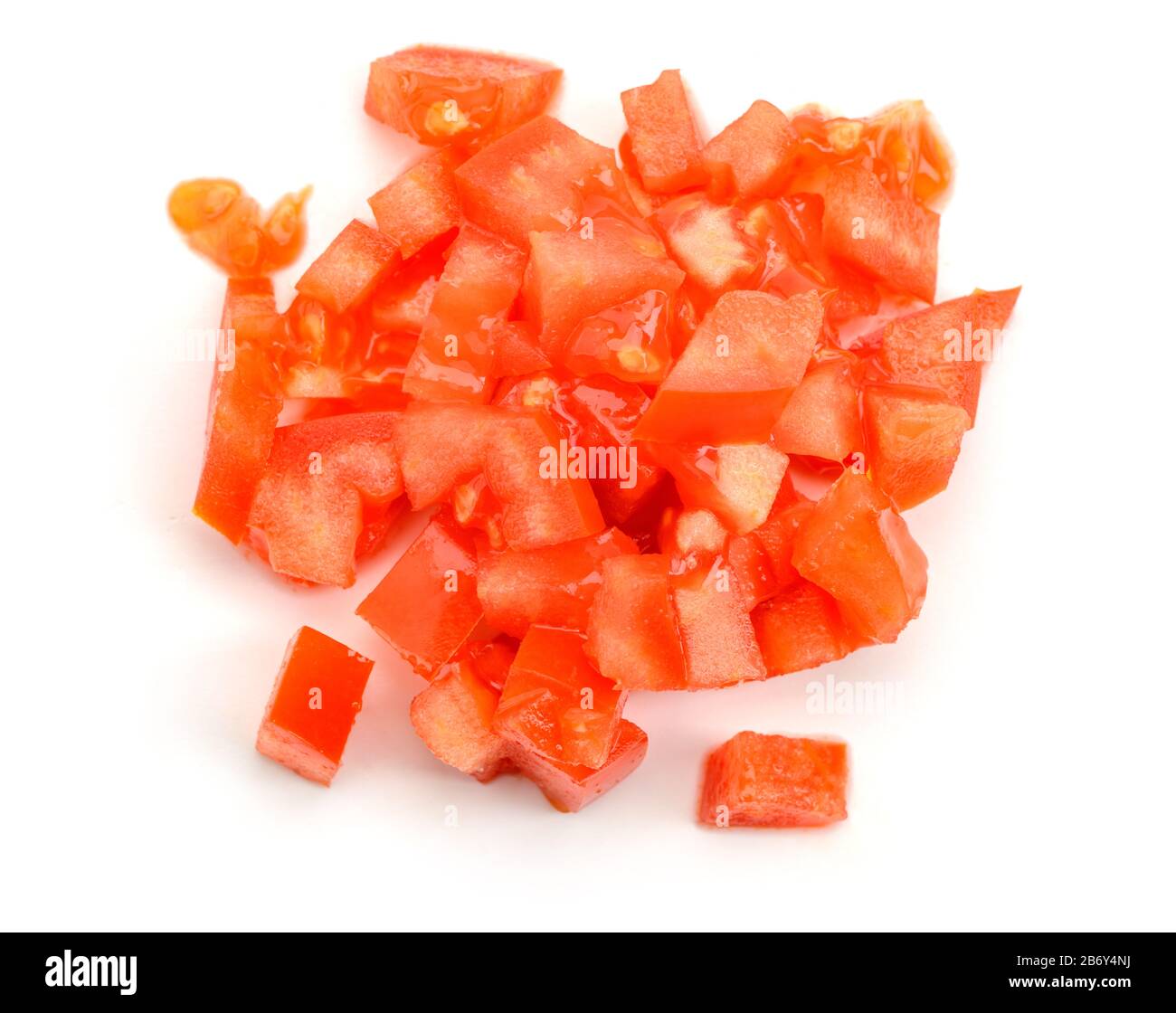 Heap of finely diced tomato on white background Stock Photo Alamy