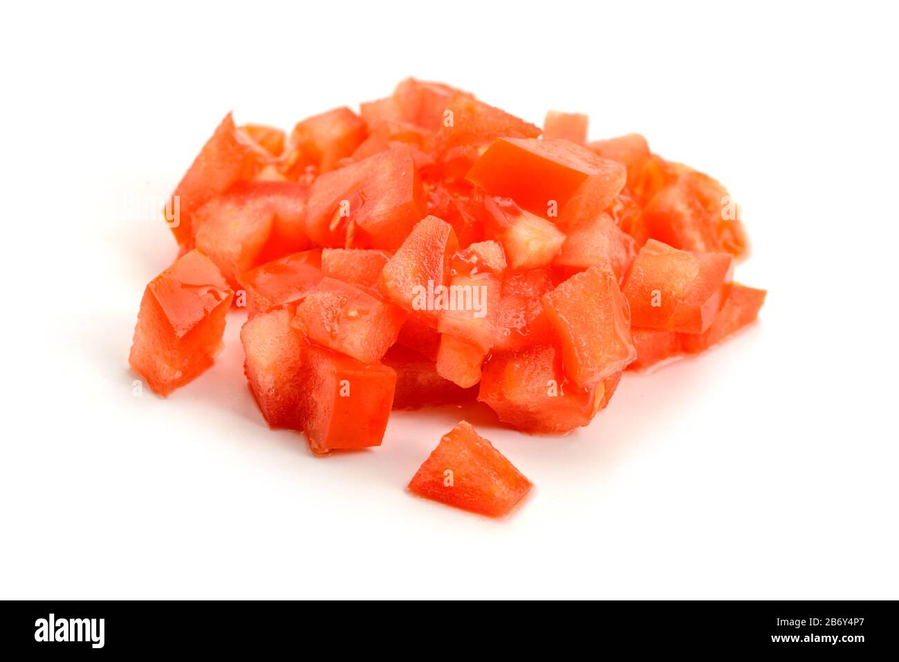 Heap of finely diced tomato on white background Stock Photo Alamy