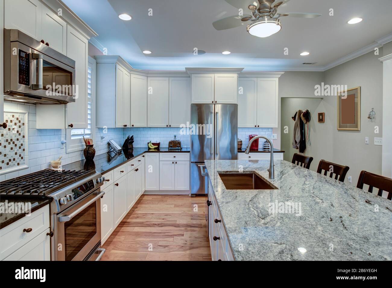 Beautiful Luxury Kitchen With Quartz And Granite Countertops And