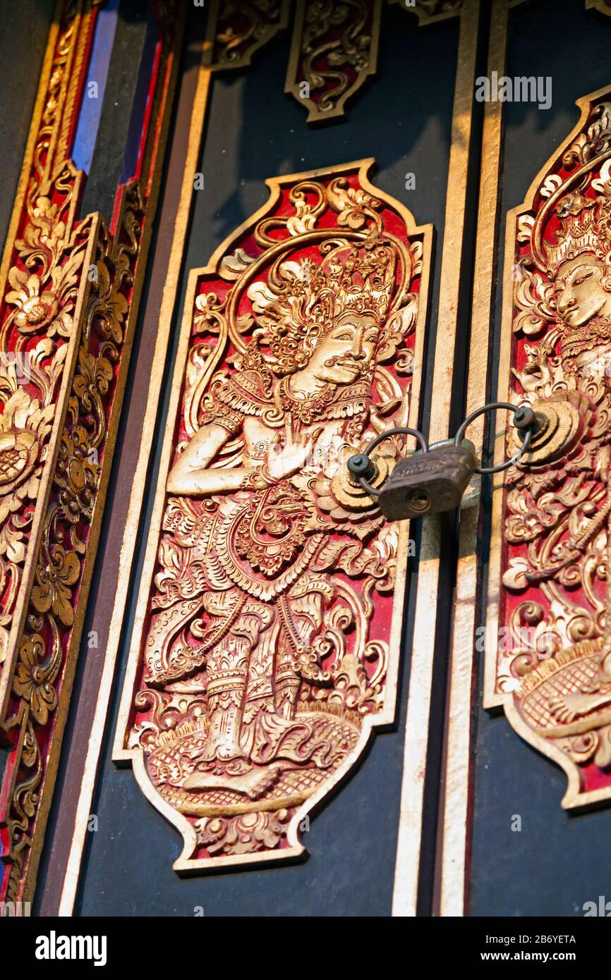 Indonesia, Bali, Sukawati, Batuan Village, Pura Puseh (Batuan Temple), Carved Wooden Doorway (Detail) Stock Photo