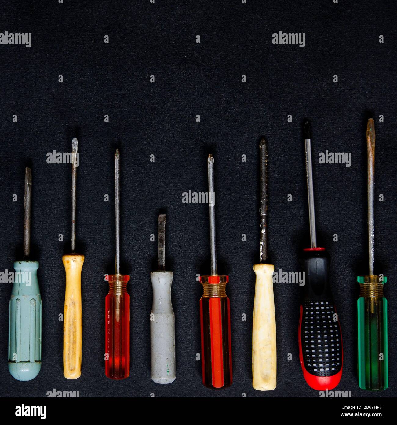 Screwdrivers of different shapes, sizes and colors for repair and