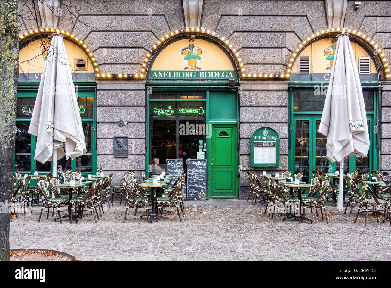Axelborg Bodega restaurant & cafe with outside tables on Axeltorv Square in Copenhagen,Denmark Stock Photo