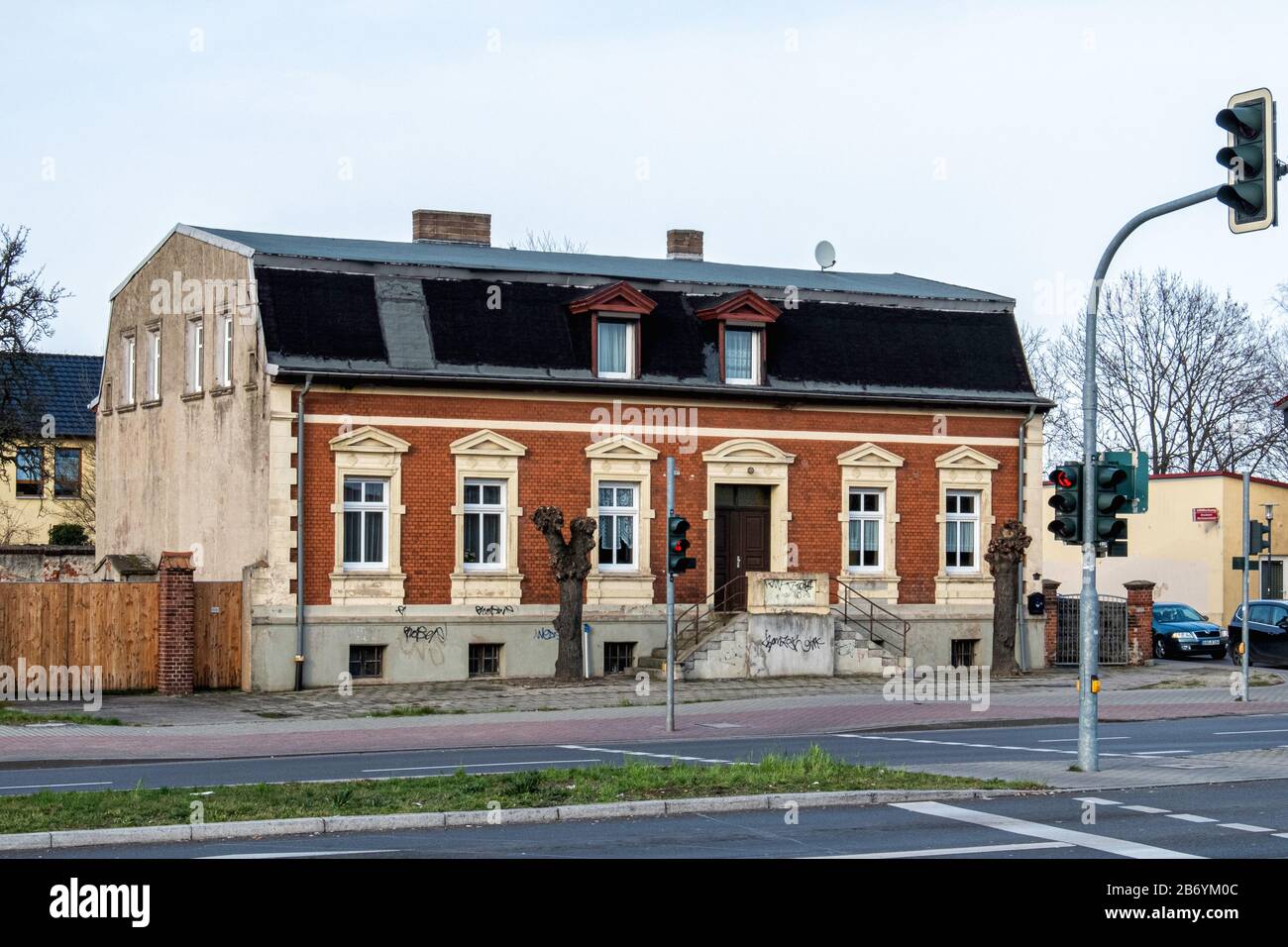 Traditional old building with gabled windows & brick facade in Berliner str.,Hönow, Hoppegarten, Brandenburg, Germany Stock Photo