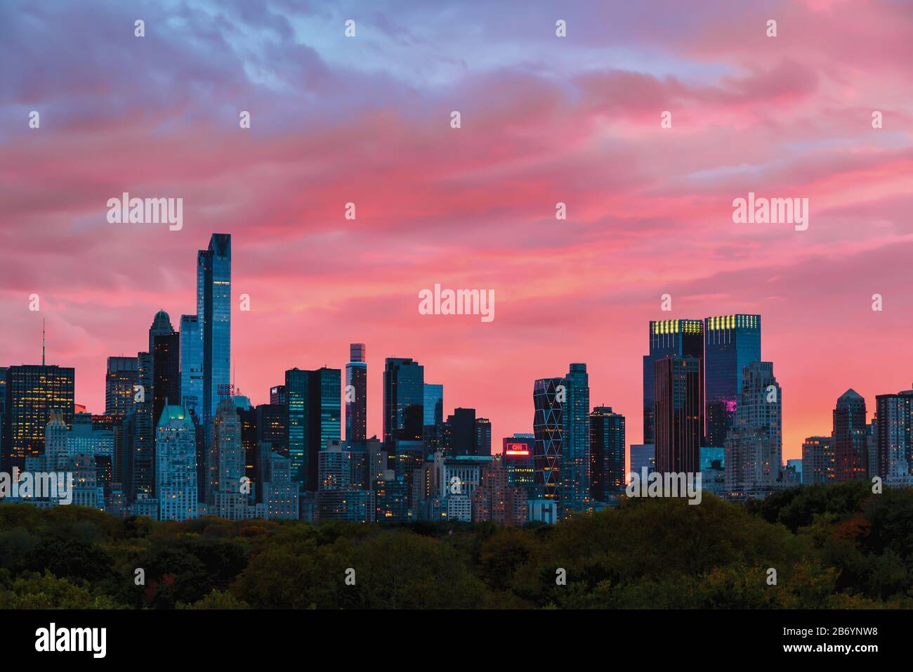 Skyline seen over Central Park at dusk, New York City, New York State, United States of America. Stock Photo