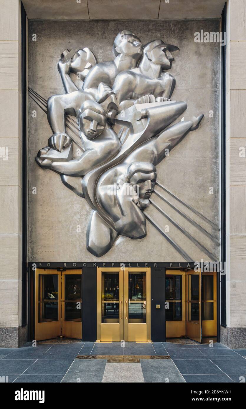 News, a stainless steel panel by Japanese American sculptor Isamu Noguchi, 1904 - 1988, above the entrance to 50 Rockefeller Plaza, New York, New York Stock Photo