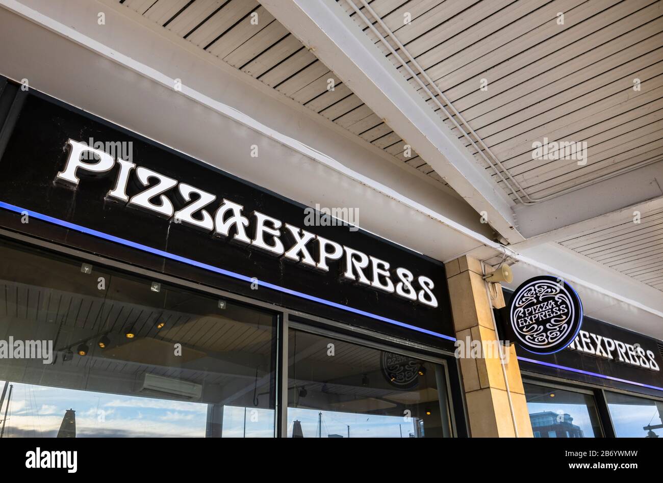 Exterior and name sign of Pizza Express Italian restaurant in Gunwharf Quays shopping centre
