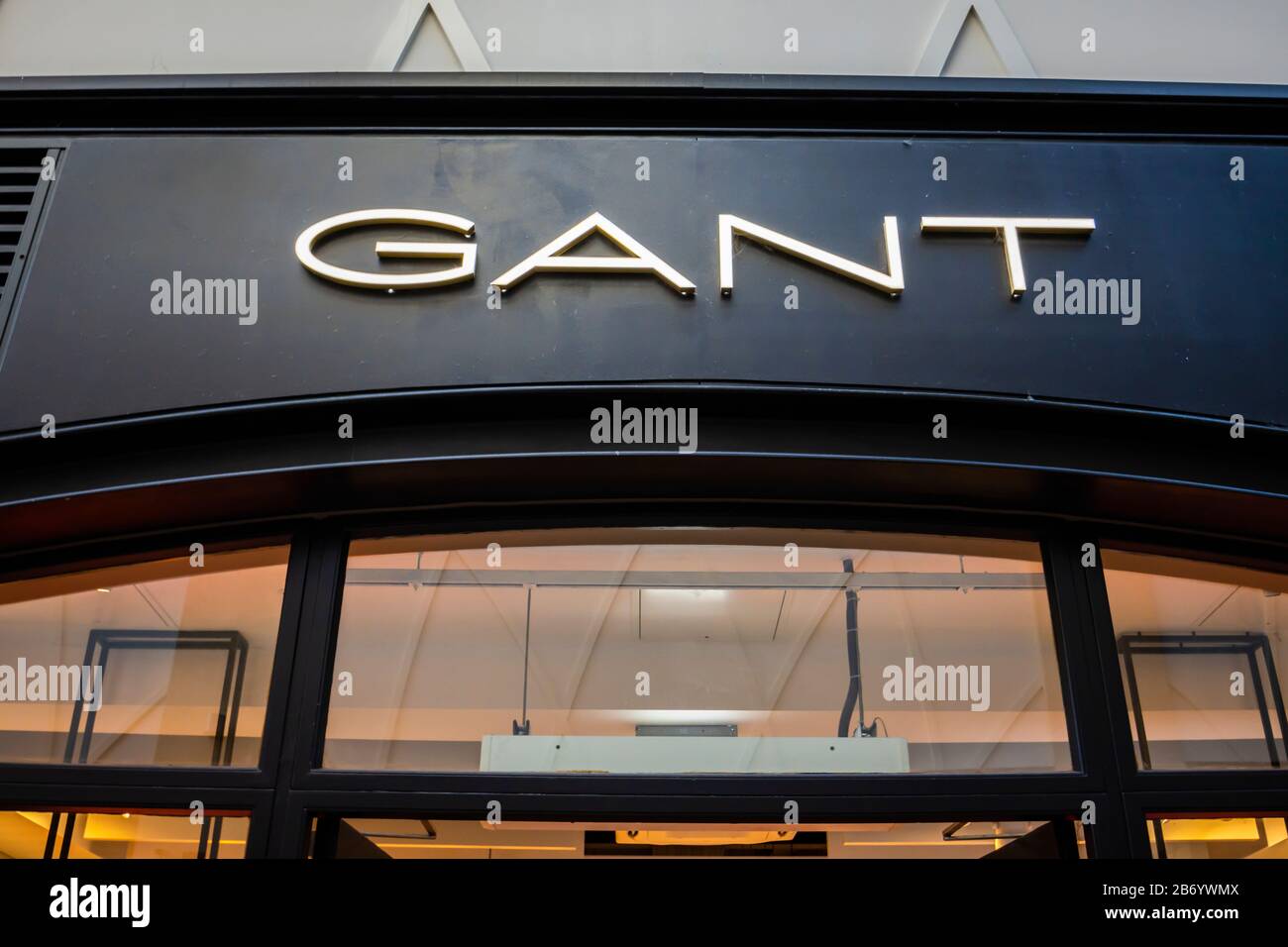 Name board of Gant, clothes retailer, above the shop front in Gunwharf  Quays shopping centre, Portsmouth, Hampshire, south coast England Stock  Photo - Alamy