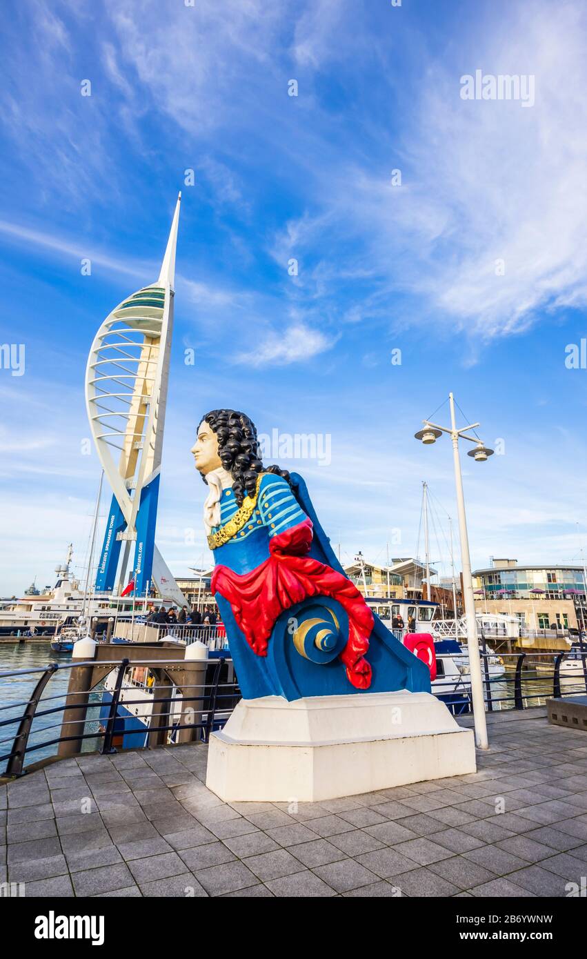 Figurehead from HMS Marlborough and the Emirates Spinnaker Tower, a coastal landmark, Gunwharf Quays, Portsmouth Harbour, Hampshire, southern England Stock Photo