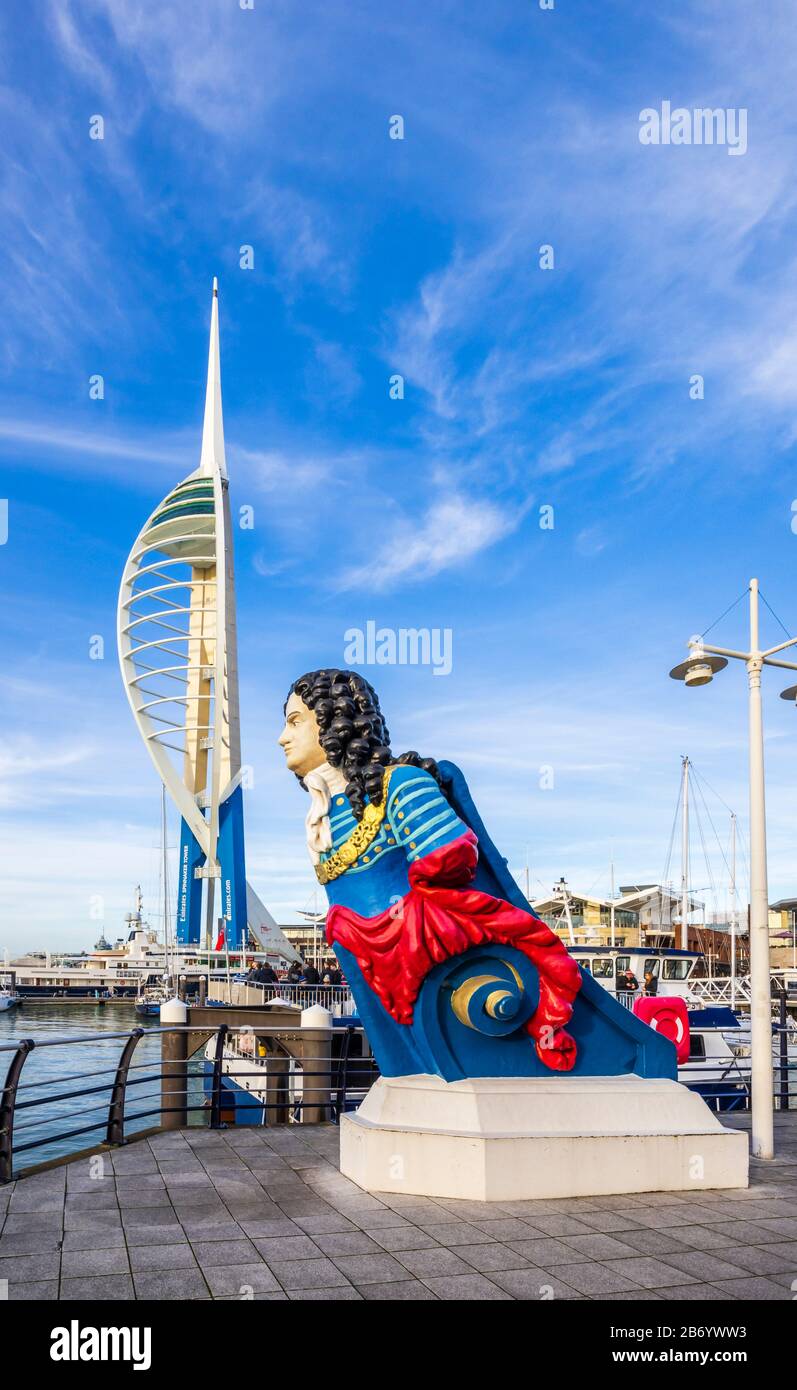 Figurehead from HMS Marlborough and the Emirates Spinnaker Tower, a coastal landmark, Gunwharf Quays, Portsmouth Harbour, Hampshire, southern England Stock Photo