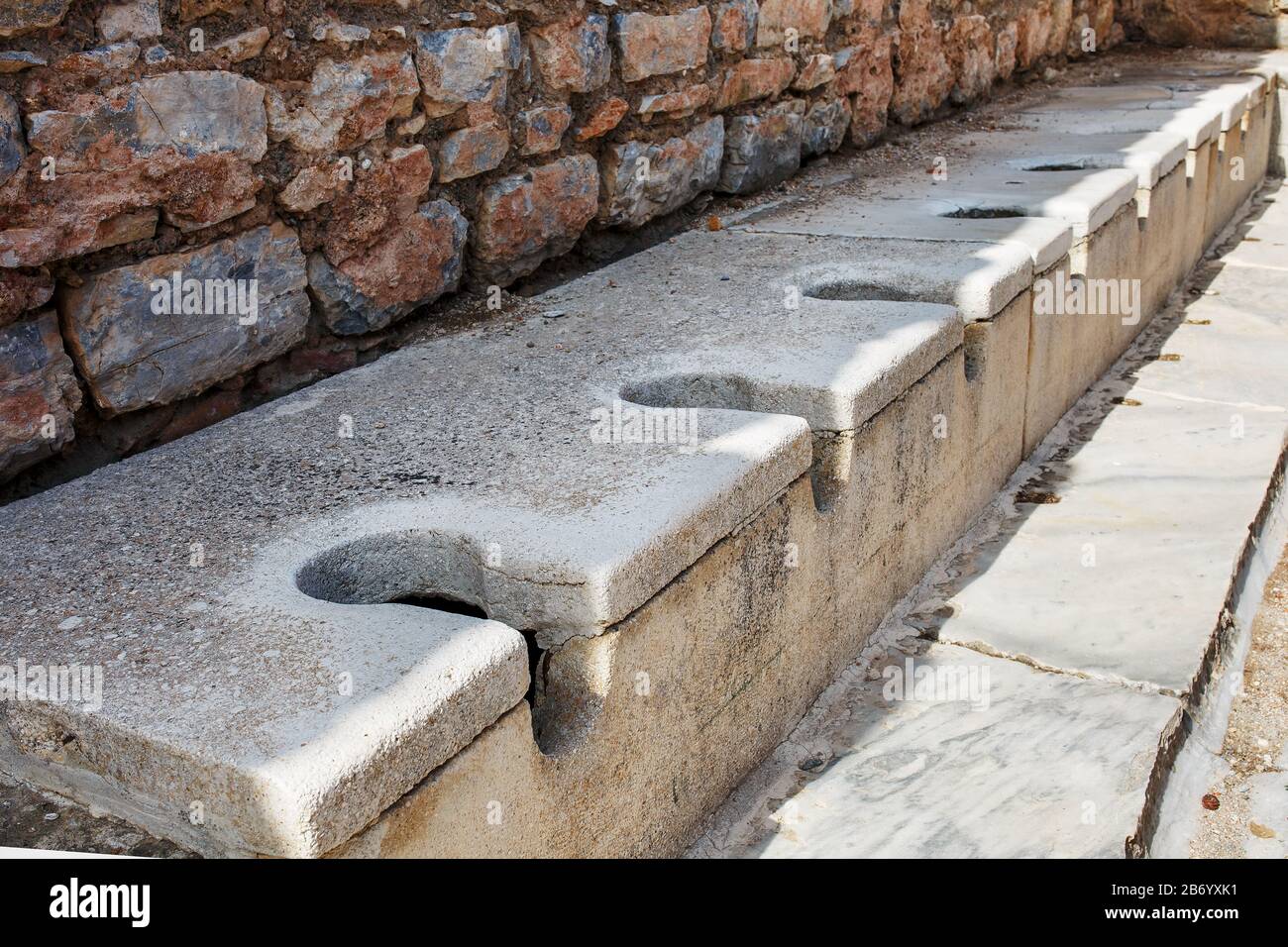 Ancient roman public latrines at ephesus, Antik genel tuvalet Latrin, Turkey Stock Photo