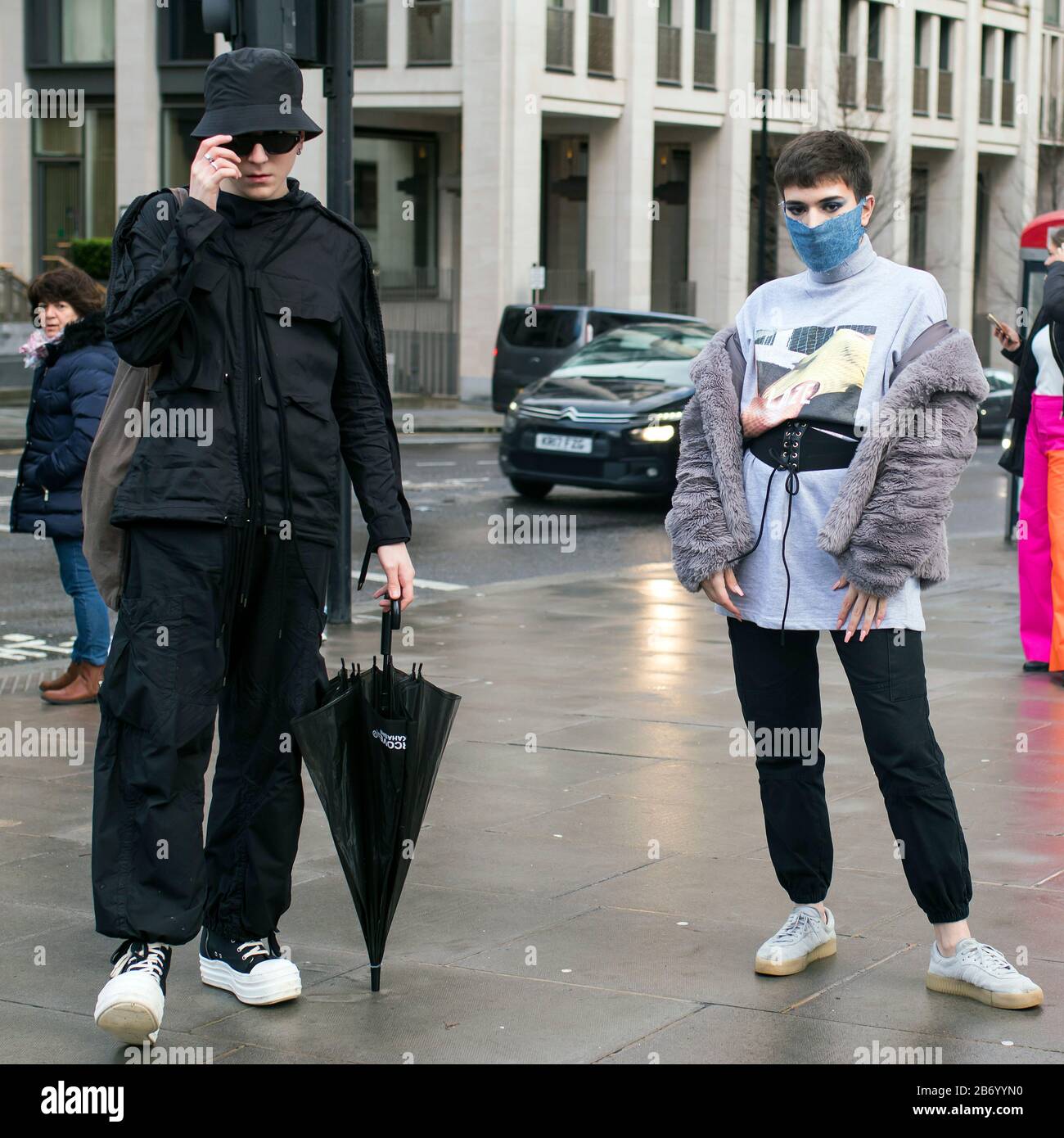 LONDON, UK- febryary 15 2020: Fashionable people on the street . Street style Stock Photo