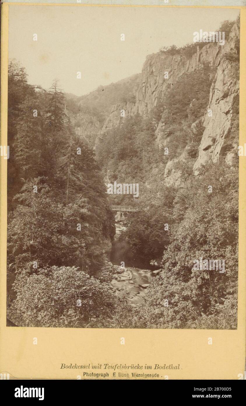 Kloof met de Duivelsbrug in het Bodedal in de Harz Bodekessel mit Teufelsbrucke im Bodethal (titel op object) Part of album with 38 pictures of a trip the Harz. Manufacturer : photographer: E. Rose (listed property) Place manufacture: Harz Dating: ca. 1870 - ca. 1890 Physical features: albumen print material: paper cardboard paper Technique: albumen print dimensions: photo: h 140 mm × W 101 mm Subject: traveling; tourismravine, chasm, abyss, canyon where: Harz Stock Photo